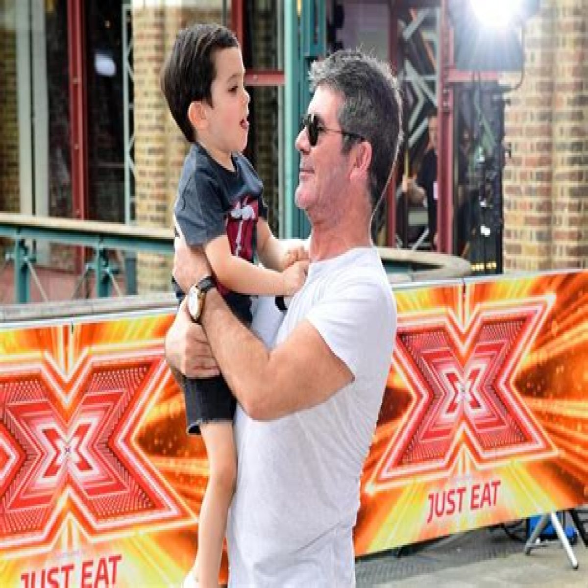 Unraveling The Truth: Does Simon Cowell's Son Have An Illness?